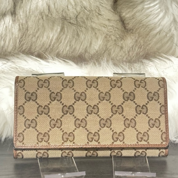 Gucci Handbags - 💰⬇️ GUCCI 
Pre-Loved Beige GG Canvas Flap Continental Wallet 💕